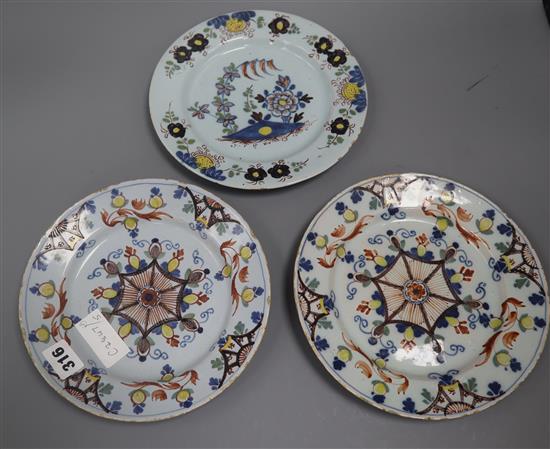 Three 18th century Delft plates painted in Fazackerey colours 22cm